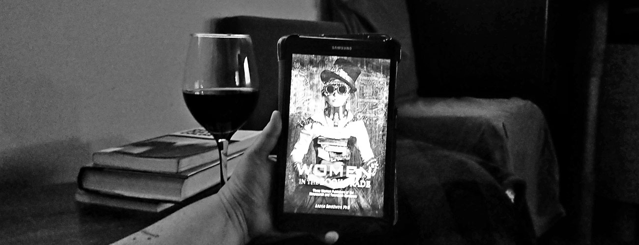 Drinking a glass of wine and reading Women in the Book Trade